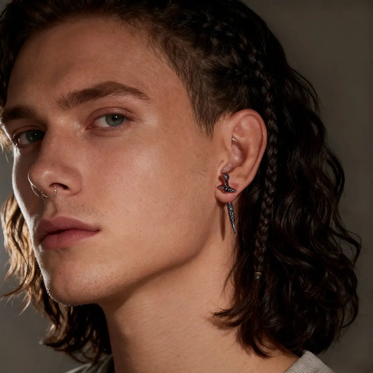 Xenos Jewelry Sword Earrings Through Ear worn